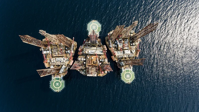 An overhead shot on and oil and gas platform offshore.