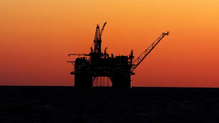 Oil platform silhouette offshore
