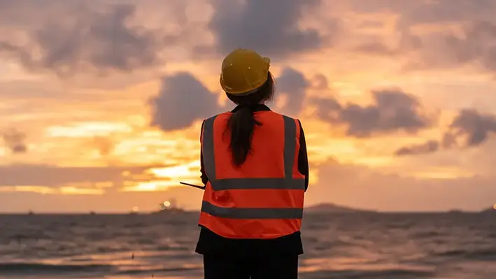 female-engineer-overseeing-infrastructure-sea
