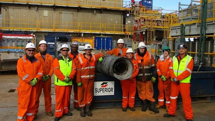 Some of the team with the final conductor piece removed from Mackerel using Rig 22. (Image source: Esso Australia)